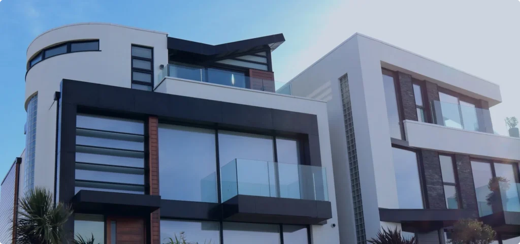 Modern commercial building exterior for real estate management - JT Management Inc.